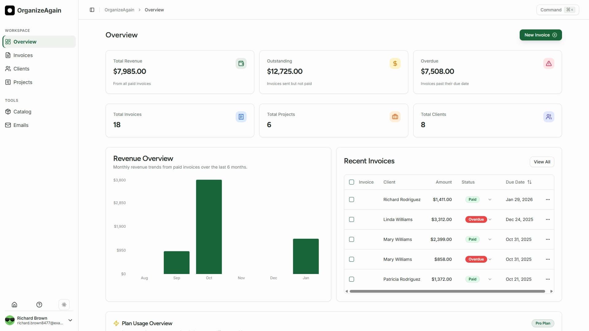 A stylish and modern office workspace showing a laptop with an invoice on the screen.